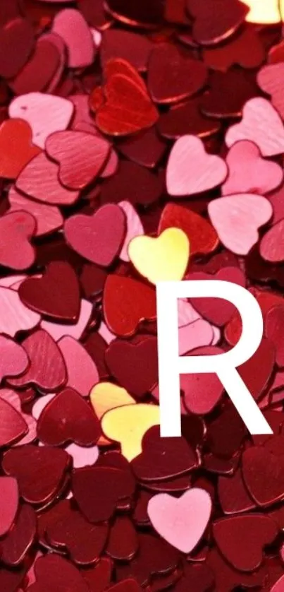 Red heart pattern wallpaper with letter R.