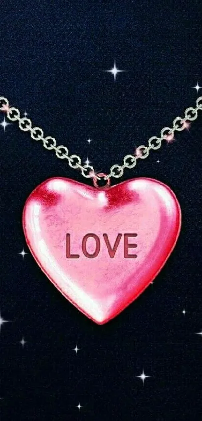 Red heart pendant with 'LOVE' on dark background.