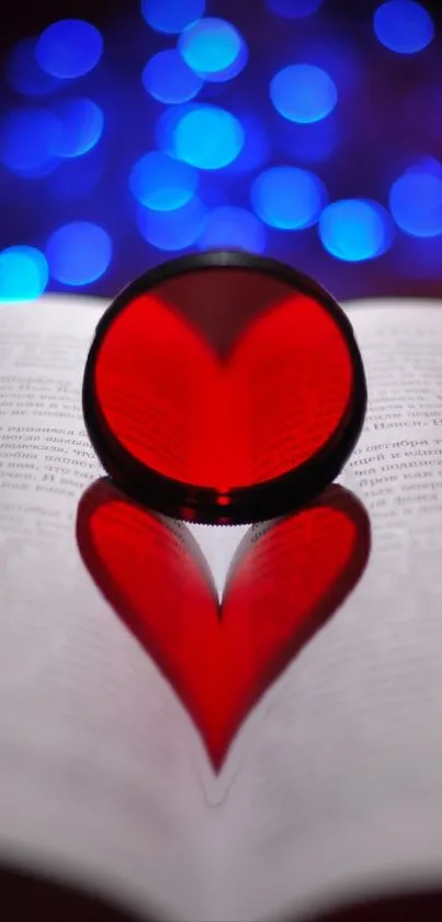 Red heart shape reflected on an open book with vibrant bokeh background.