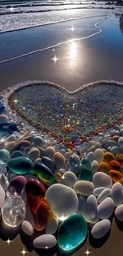 Heart-shaped arrangement of colorful stones on a sandy beach at sunrise.