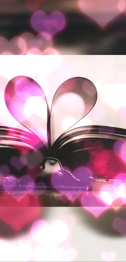 Book pages form a heart with pink bokeh overlay.