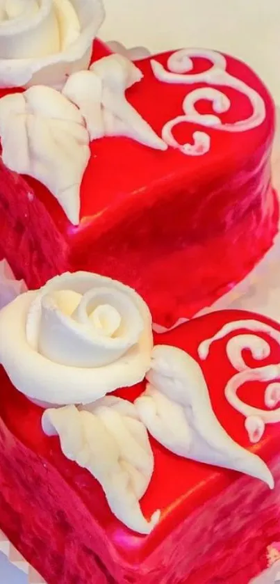 Heart-shaped cakes with red icing and white roses.