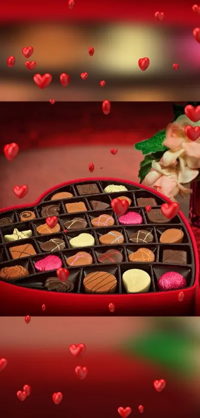 Heart-shaped chocolate box with a red backdrop and flower accents.