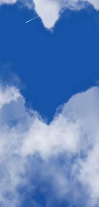 Heart-shaped cloud in blue sky wallpaper.