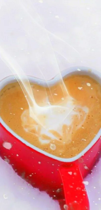 Heart-shaped red coffee cup on white background.