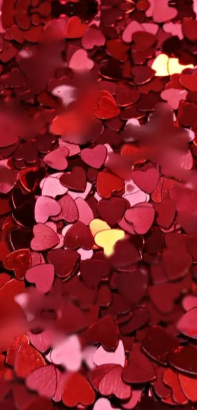 Heart-shaped red confetti design for mobile wallpaper.