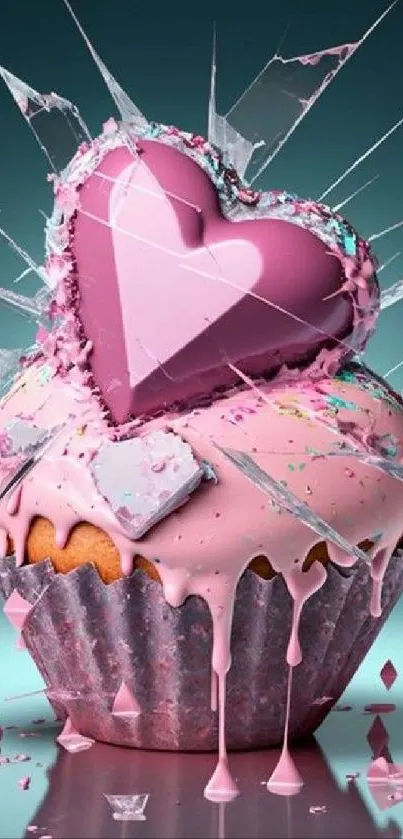 Heart-shaped cupcake with broken glass effect on pink and teal background.