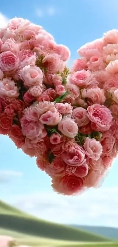 Heart of pink roses against a blue sky.