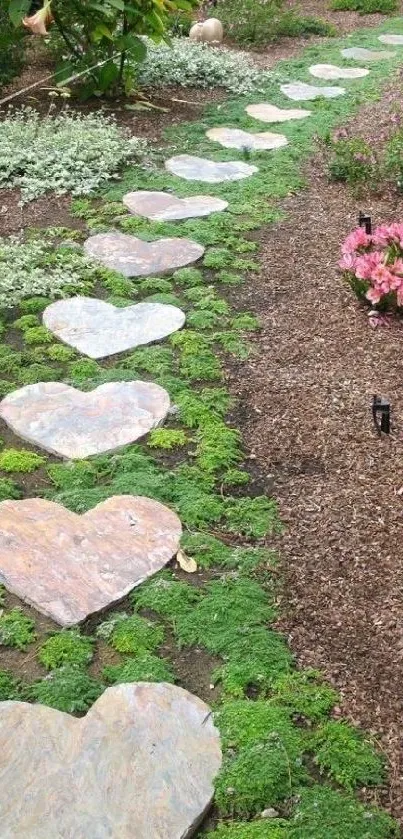 Heart-shaped stones on a garden path surrounded by flowers and greenery.