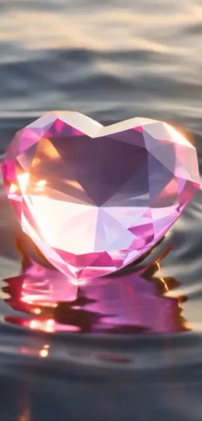 Heart-shaped pink gem floating on water.