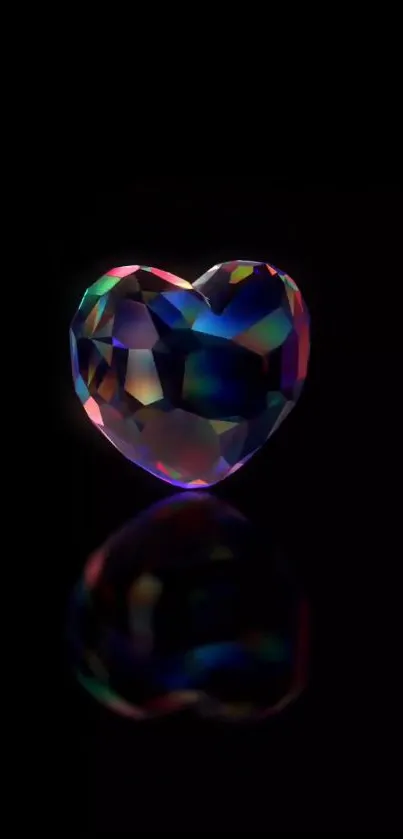 Heart-shaped gemstone with colorful facets on a black background.