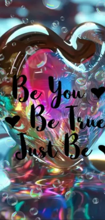 Colorful heart-shaped glass art with motivational quote.
