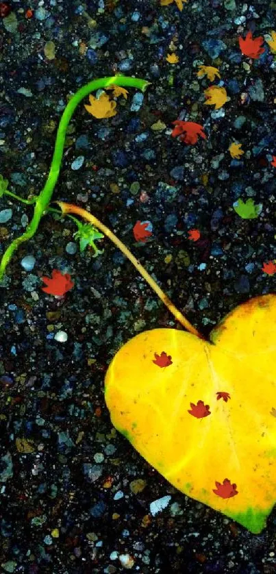 Heart shaped yellow leaf on textured stone background mobile wallpaper.