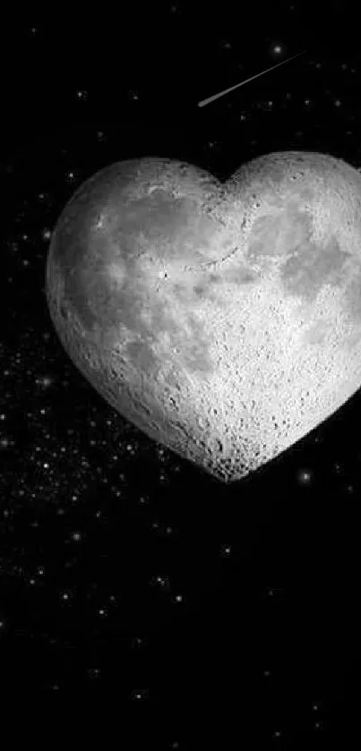 Heart-shaped moon against a starry black sky.