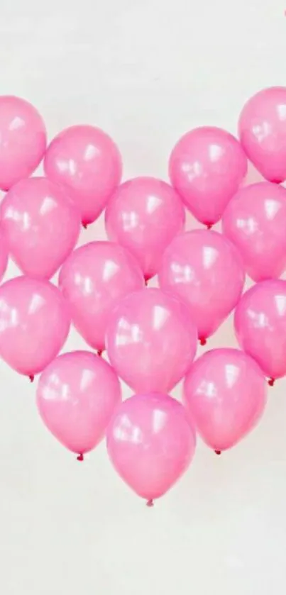 Heart-shaped pink balloons on a white background, creating a lovely design.