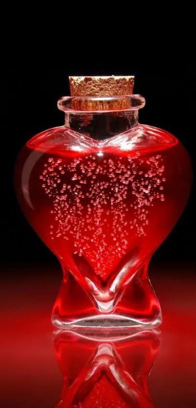 Heart-shaped bottle with red liquid on black background.