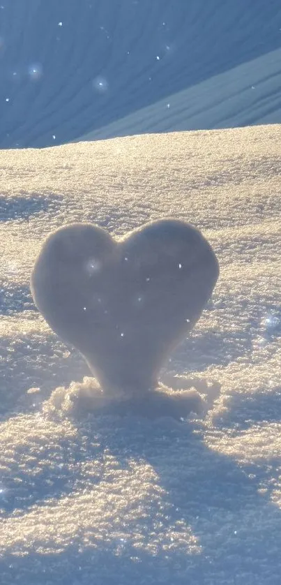 Heart-shaped snow shadow in winter light.