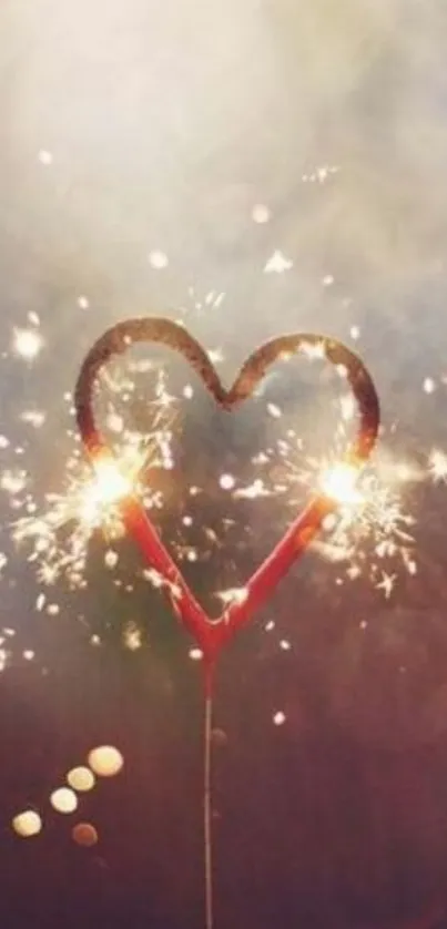 Heart-shaped sparkler glowing warmly against a blurred brown background.