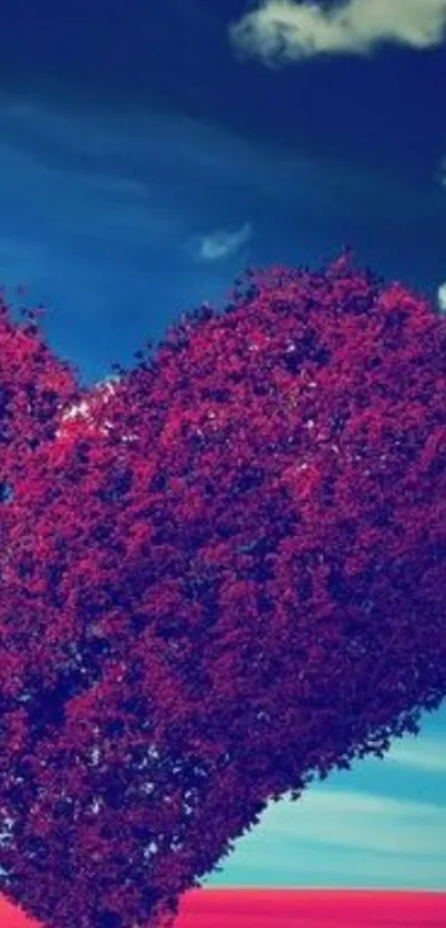 Heart-shaped red tree against a blue sky.