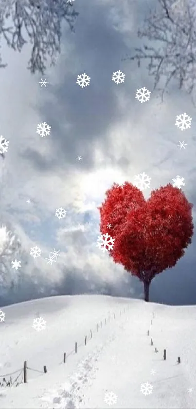 Heart-shaped red tree in snowy winter landscape.