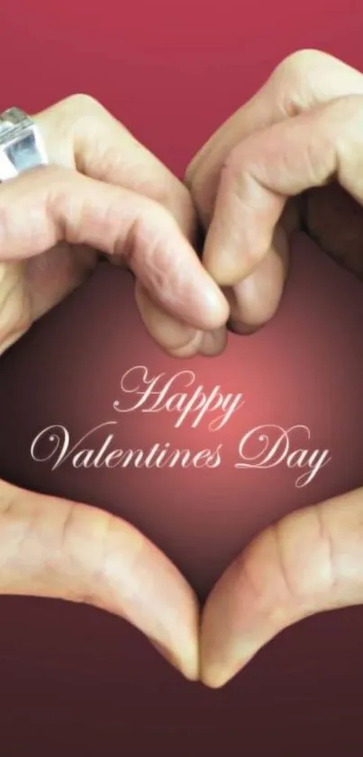 Valentine's Day wallpaper with hands forming a heart against a red background.