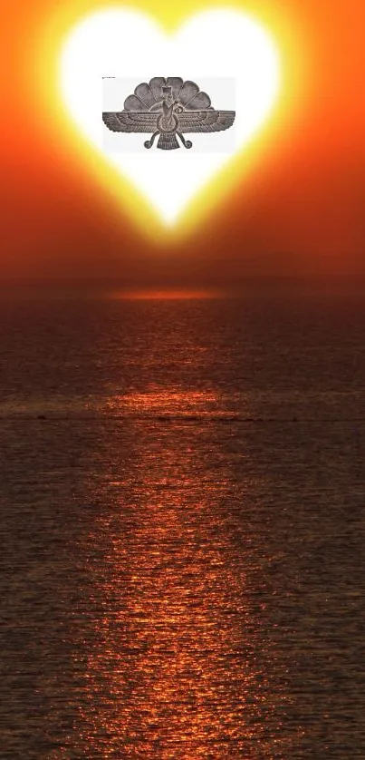 Sunset with heart shape over ocean creating a serene and warm view.