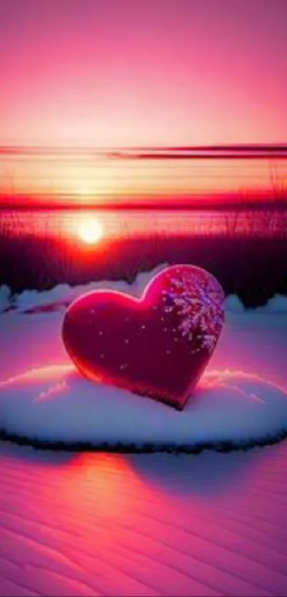 Heart on snow with vibrant sunset.