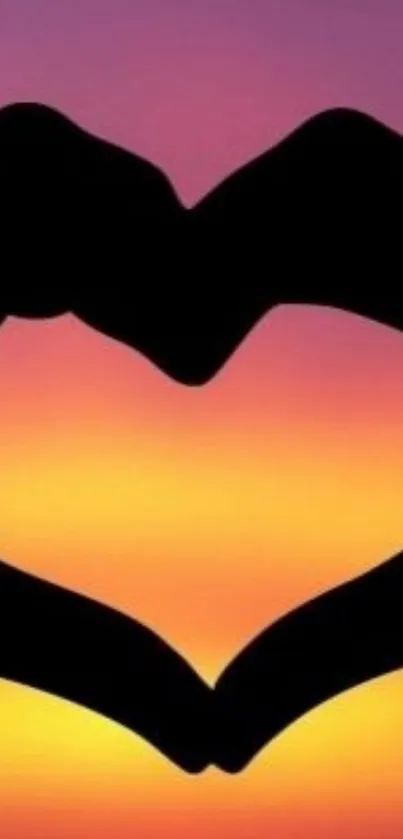 Heart silhouette against a vibrant orange sunset gradient wallpaper.