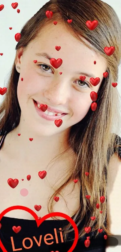 Mobile wallpaper with red hearts surrounding a smiling girl.