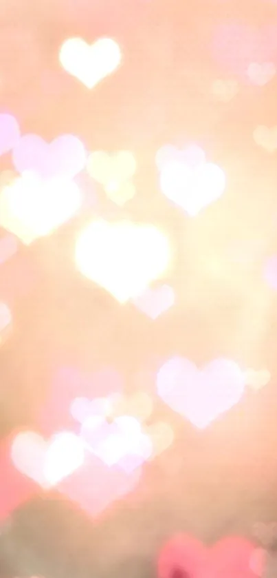 A dreamy heart-themed mobile wallpaper with soft, glowing pink and peach bokeh.