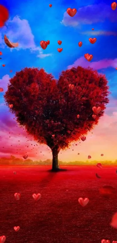 Heart-shaped tree against vibrant sunset in red and blue hues.