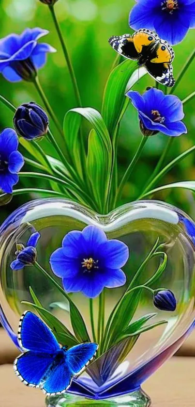 Heart-shaped glass vase with blue flowers and butterflies.