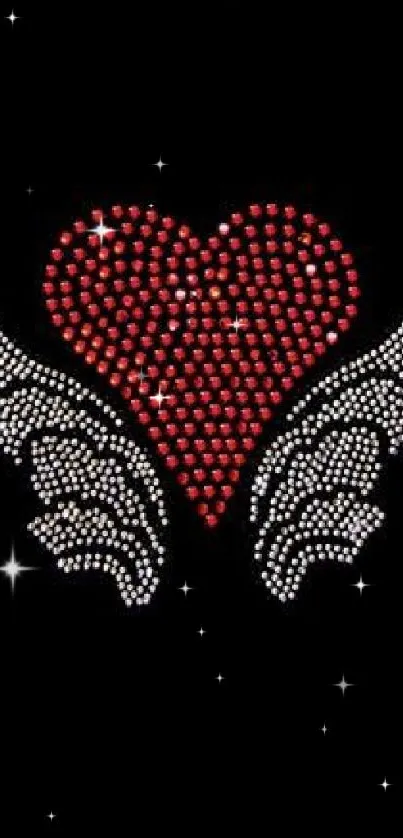 Rhinestone heart with white wings on a black background.