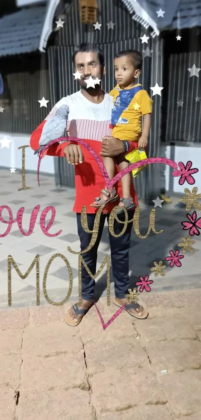 Father holding child with 'I love you MOM' text.