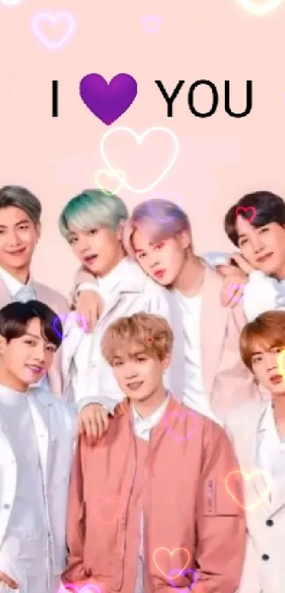 Heartfelt wallpaper with group photo and 'I Love You' text on pastel background.