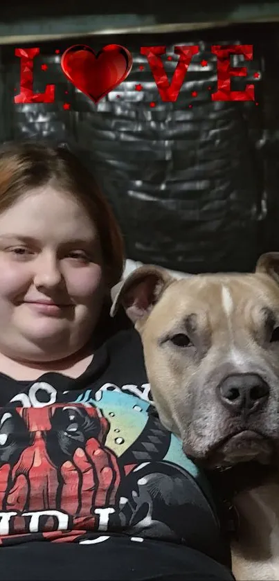 Person smiling with a dog and the word 'LOVE' above them.