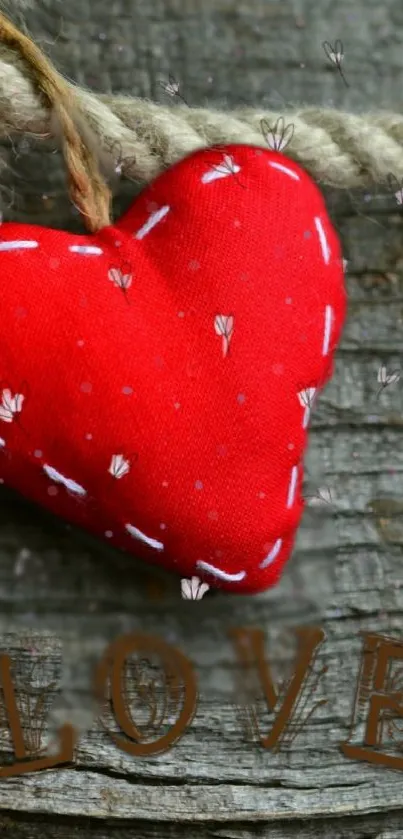 Red heart on rustic wood with 'LOVE' text.