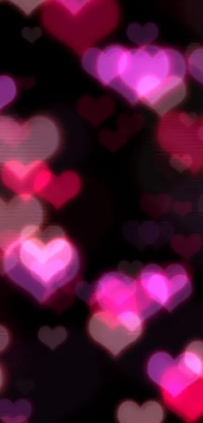 Romantic mobile wallpaper with glowing hearts in vibrant hues on a dark background.