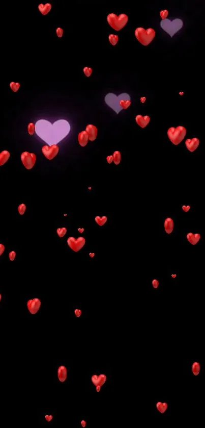 Romantic wallpaper with red hearts on a black background for mobile.