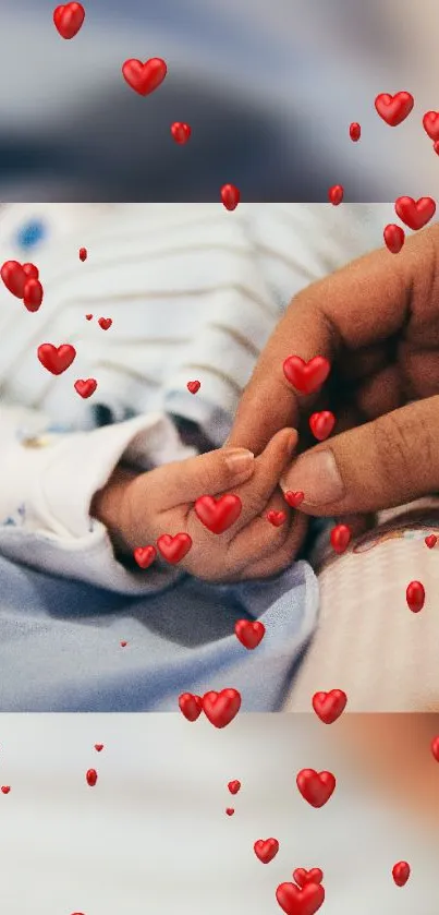 Baby's hand with floating hearts, symbolizing love.