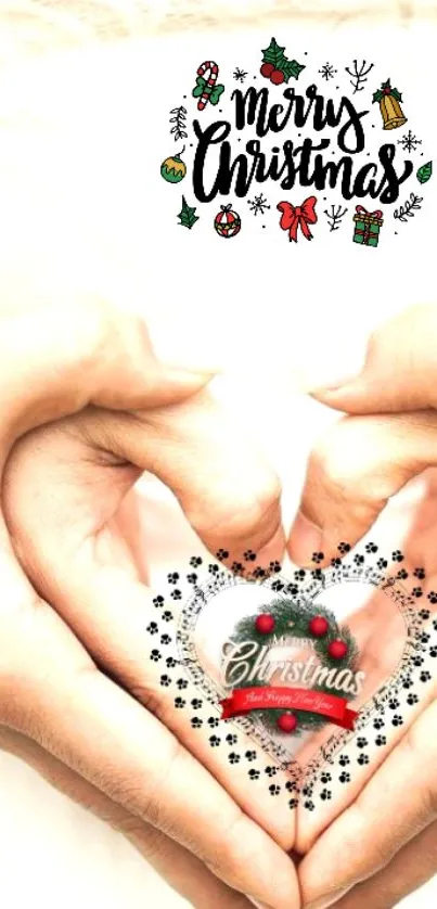 Hands forming heart with Christmas decoration.