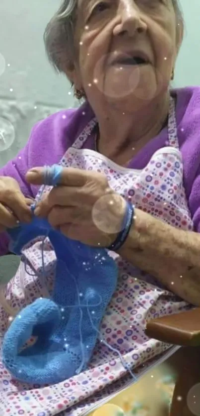 Elderly woman knitting in cozy lavender attire.