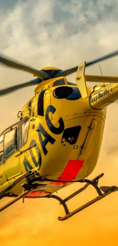 A helicopter flying against a vibrant sunset sky.