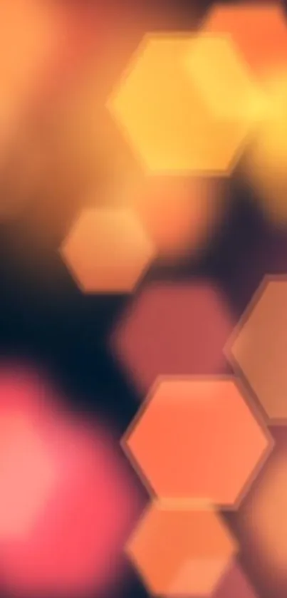 Hexagonal bokeh wallpaper with orange hues and abstract design.