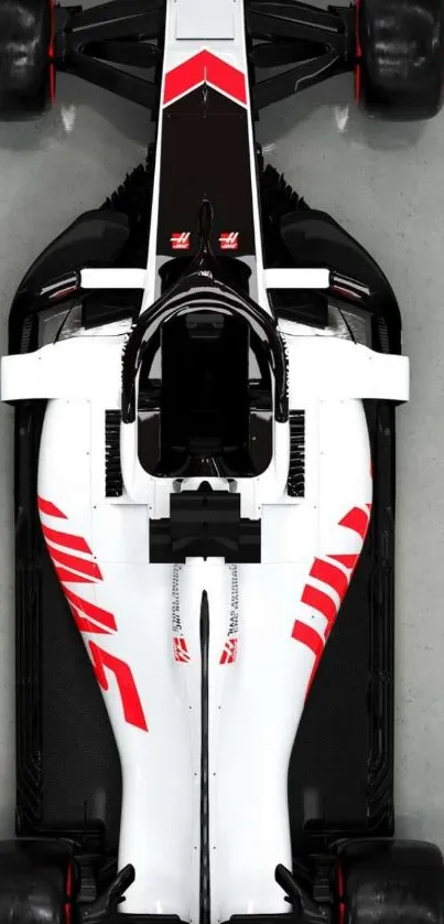 Top view of a high-speed race car with red and black design.