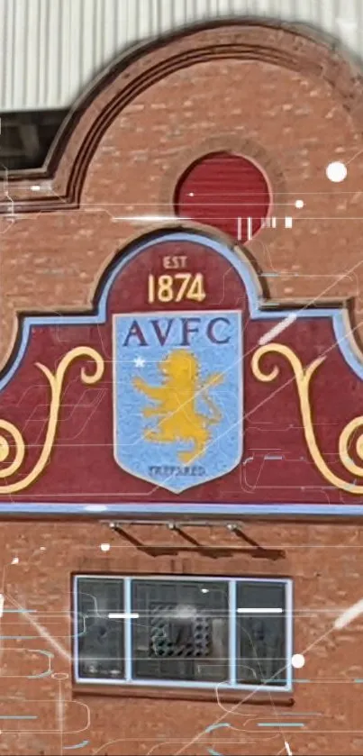 Historic brick building with center emblem design.