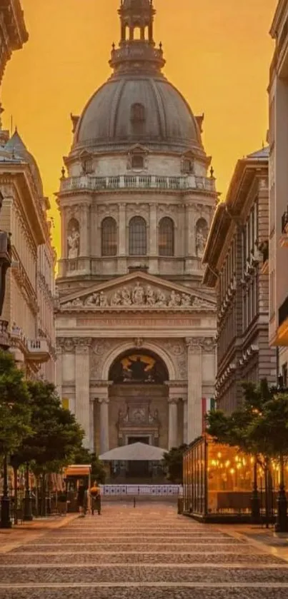 Historic cathedral at sunset on city street.