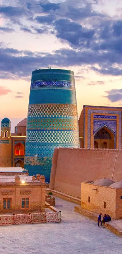 Stunning view of an ancient cityscape with a blue dome at sunset.