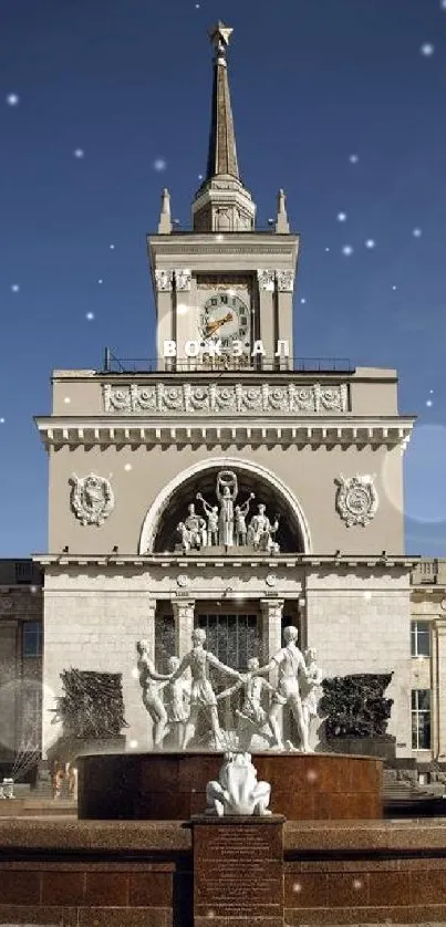 Historic clock tower with sculptures and sky backdrop.