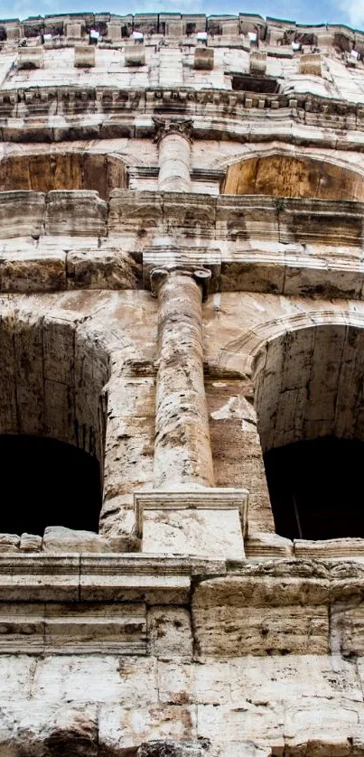 Close-up of Colosseum showing stone arches.